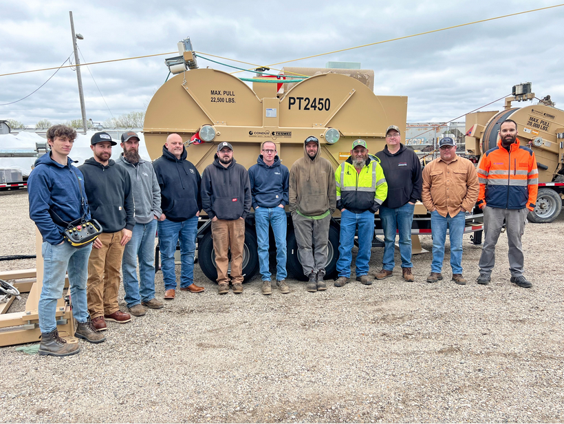 Group of people standing in line for a photo